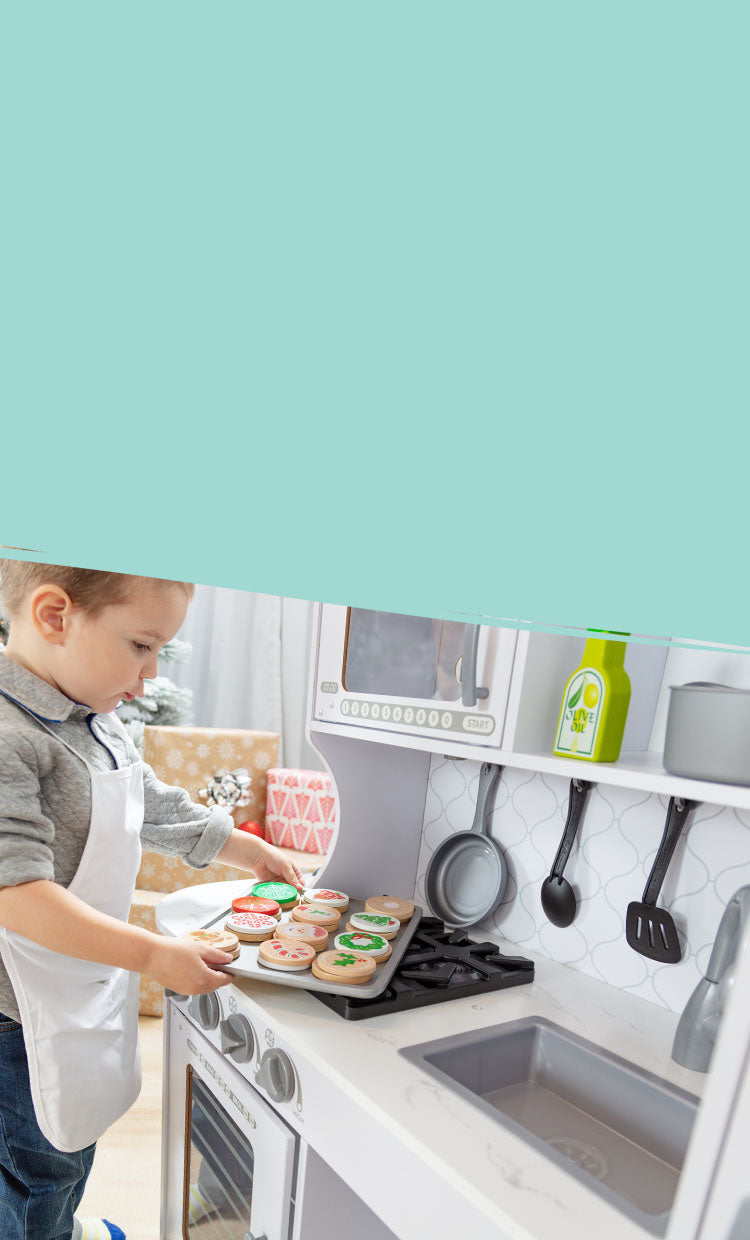 Child playing with Cloud Kitchen & Christmas Cookies