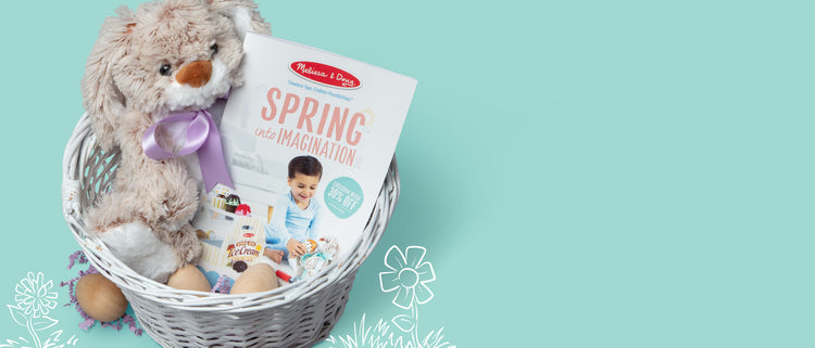 easter basket filled with stuffed bunny and spring catalog