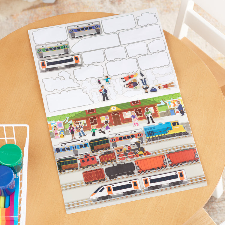 A playroom scene with The Melissa & Doug Reusable Sticker Pad: Vehicles - 165+ Reusable Stickers