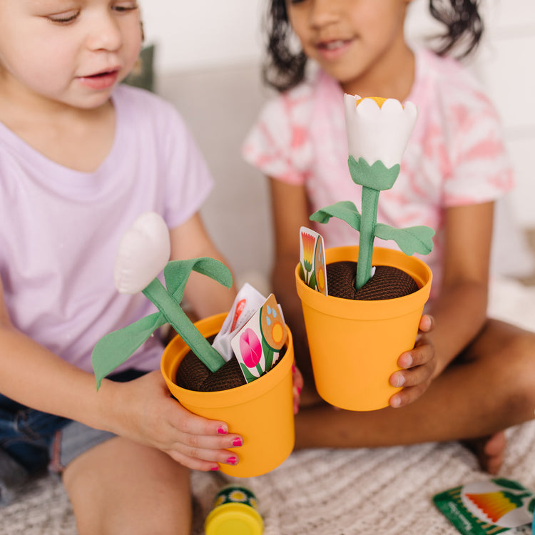 plastic toy plants Let's Explore Flower Gardening Play Set- Melissa and Doug