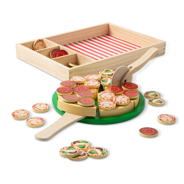The loose pieces of The Melissa & Doug Wooden Pizza Party Play Food Set With 36 Toppings