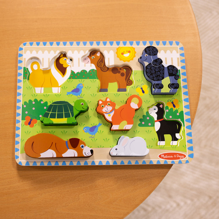 A playroom scene with The Melissa & Doug Pets Wooden Chunky Puzzle (8 pcs)