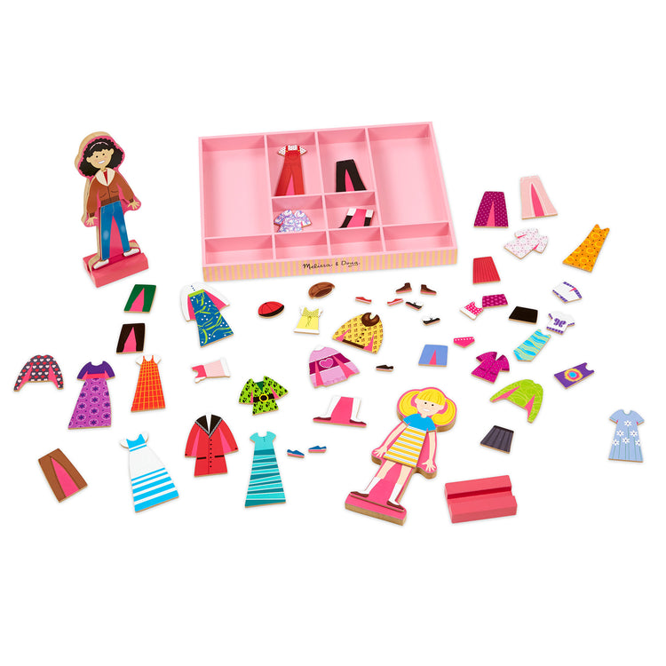 The loose pieces of The Melissa & Doug Abby and Emma Deluxe Magnetic Wooden Dress-Up Dolls Play Set (55+ pcs)