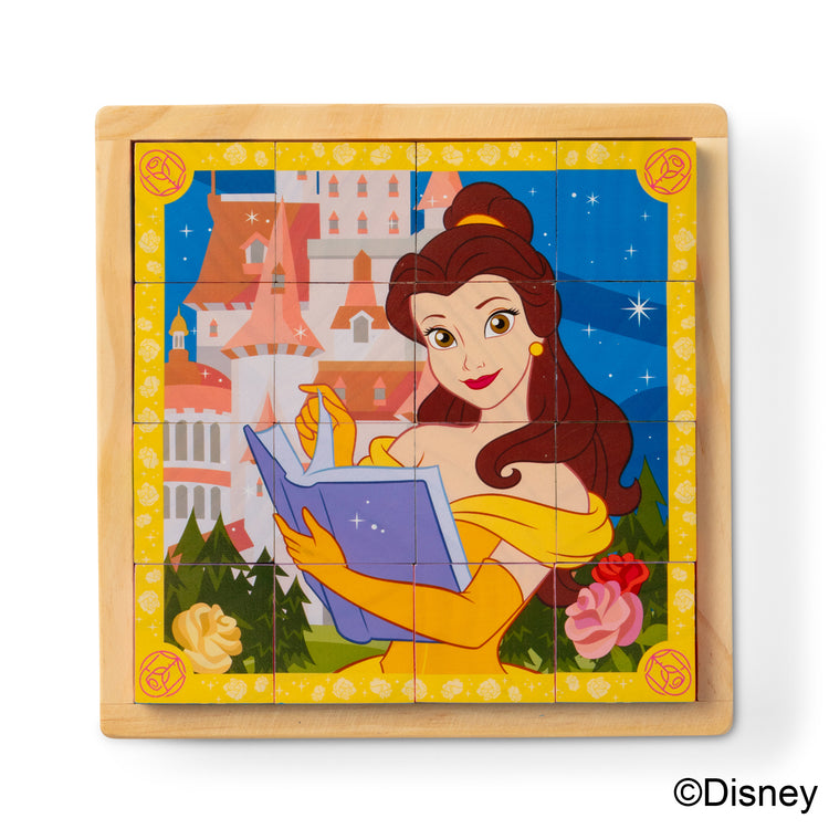 The loose pieces of The Melissa & Doug Disney Princess Wooden Toy Cube Puzzle Blocks for Boys and for Girls 3+