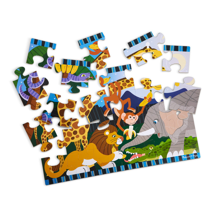 The loose pieces of The Melissa & Doug Safari Social Jumbo Jigsaw Floor Puzzle (24 pcs, 2 x 3 feet)