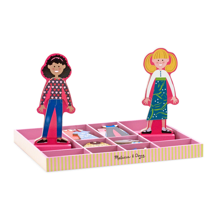 The loose pieces of The Melissa & Doug Abby and Emma Deluxe Magnetic Wooden Dress-Up Dolls Play Set (55+ pcs)