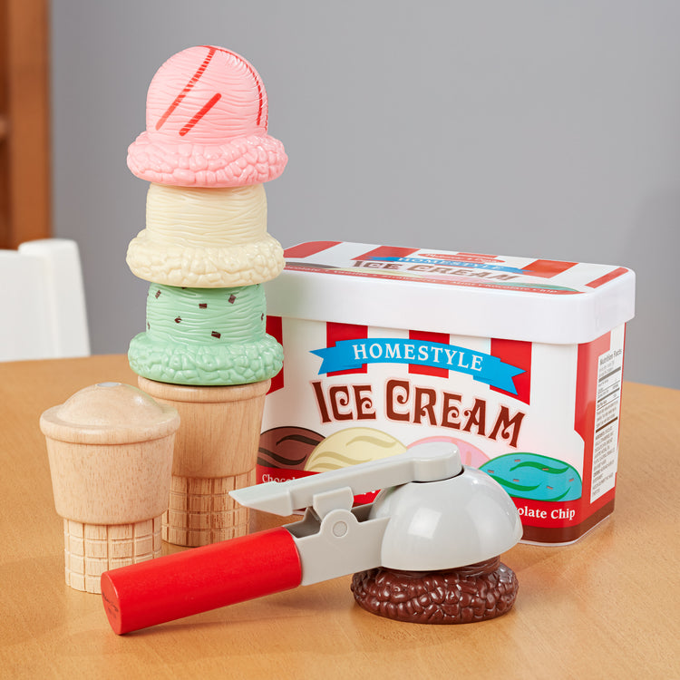 A playroom scene with The Melissa & Doug Scoop and Stack Ice Cream Cone Magnetic Pretend Play Set, Multicolor