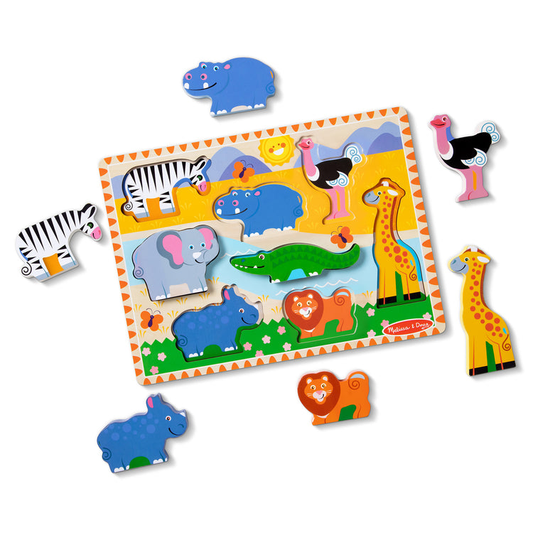 The loose pieces of The Melissa & Doug Safari Wooden Chunky Puzzle - 8 Pieces
