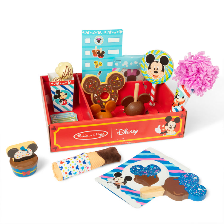 The loose pieces of The Melissa & Doug Disney Snacks & Popcorn Wooden Play Food Set – 24 Pieces | Mickey Mouse, Minnie, Wooden Toy for Boys and for Girls 3+
