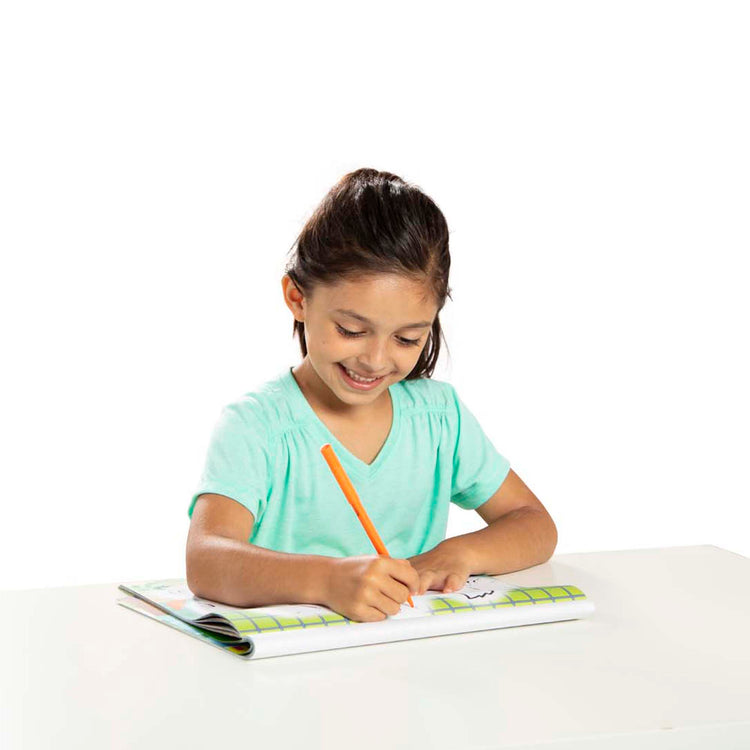 A child on white background with The Melissa & Doug 123 Dot-to-Dot Pets Coloring Pad - Follow Numbers 1-100 and Seek and Find Activities; 40 11” x 14” Pages