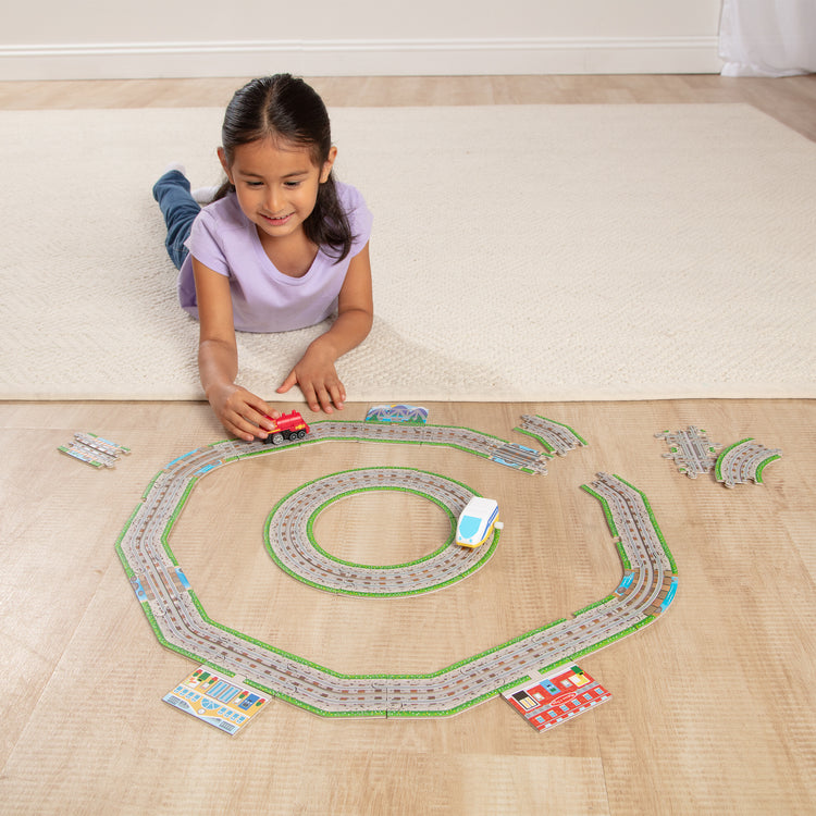 A playroom scene with The BYO Tracks Floor Puzzle
