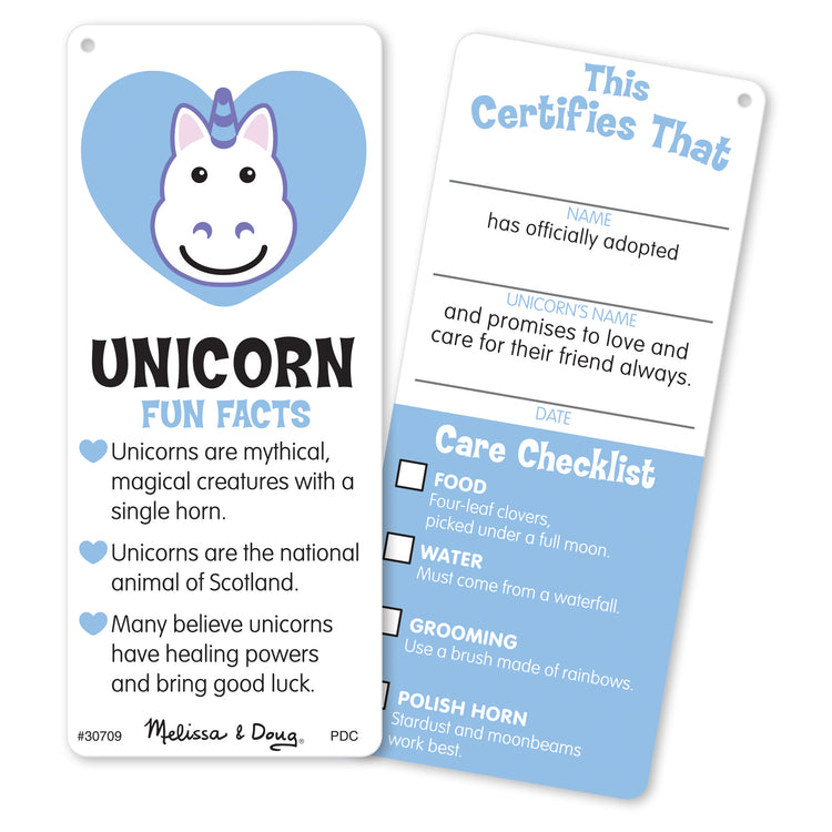 The loose pieces of The Melissa & Doug Cuddle Unicorn Jumbo Plush Stuffed Animal with Activity Card