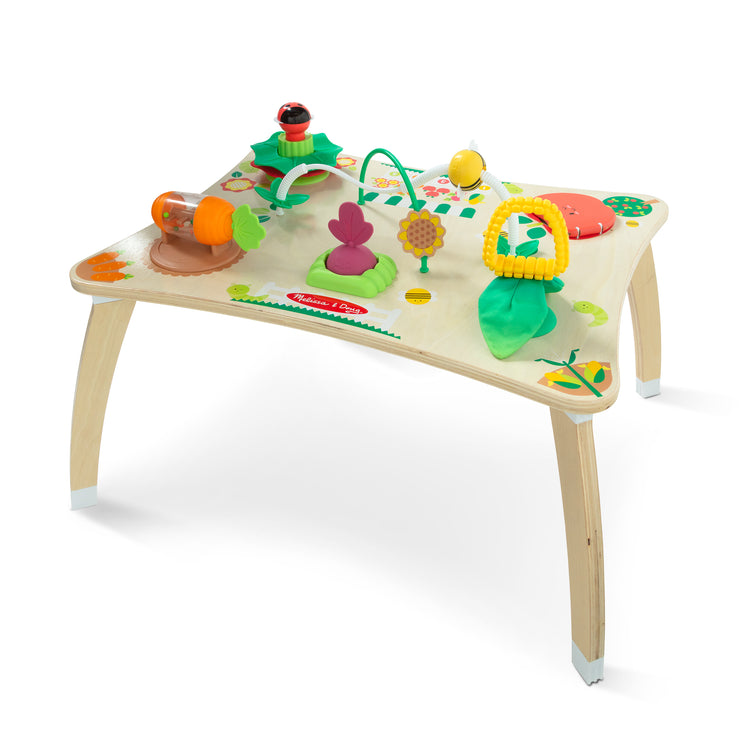 The loose pieces of The Farmers Market 3 in 1 Activity Center