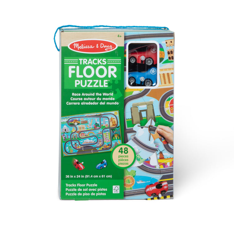 The front of the box for The Melissa & Doug Race Around the World Tracks Cardboard Jigsaw Floor Puzzle and Wind-Up Vehicles – 48 Pieces, for Boys and Girls 3+