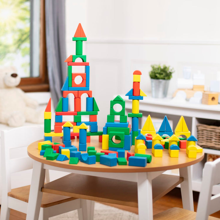 the Melissa & Doug Wooden Building Block Set - 200 Blocks in 4 Colors and 9 Shapes