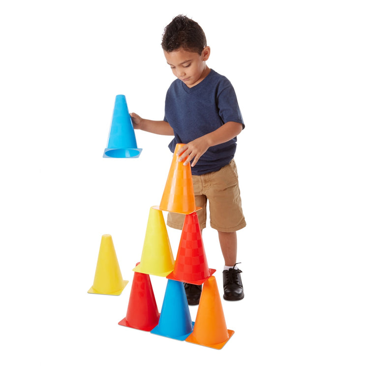 A child on white background with the Melissa & Doug 8 Activity Cones - Set of 8