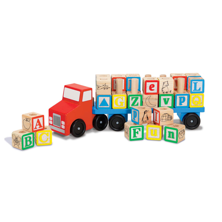 The loose pieces of the Melissa & Doug Alphabet Blocks Wooden Truck Educational Toy