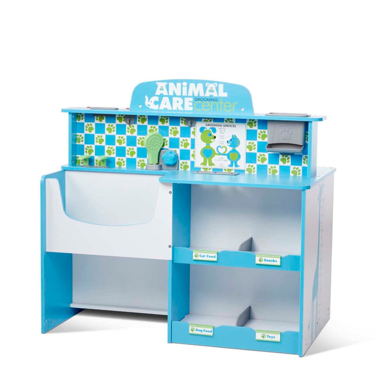 An assembled or decorated the Melissa & Doug Animal Care Veterinarian and Groomer Wooden Activity Center for Plush Stuffed Pets (Not Included)