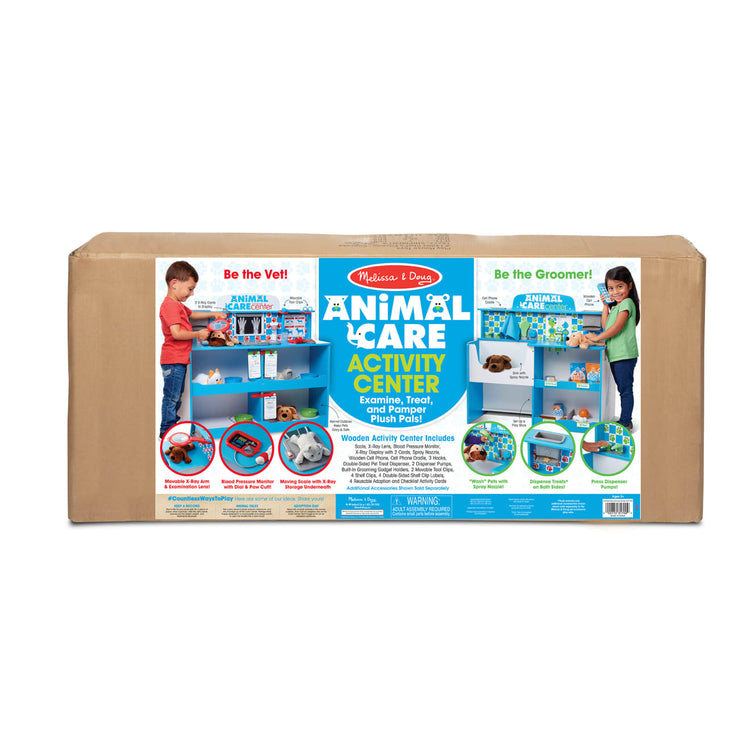 the Melissa & Doug Animal Care Veterinarian and Groomer Wooden Activity Center for Plush Stuffed Pets (Not Included)
