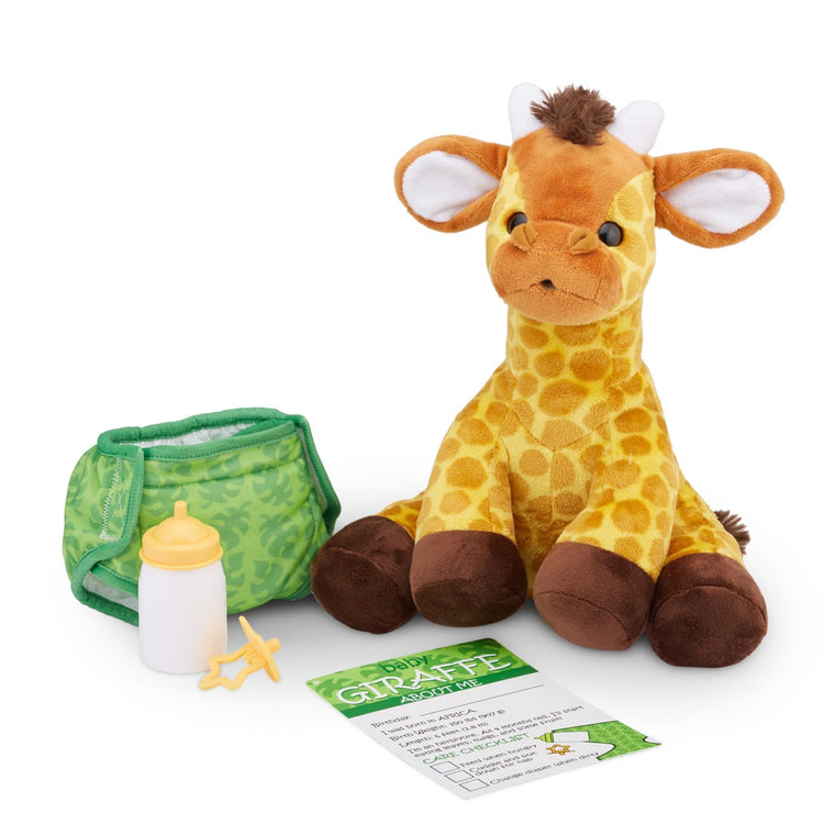T child on white background with the Melissa & Doug 11-Inch Baby Giraffe Plush Stuffed Animal with Pacifier, Diaper, Baby Bottle