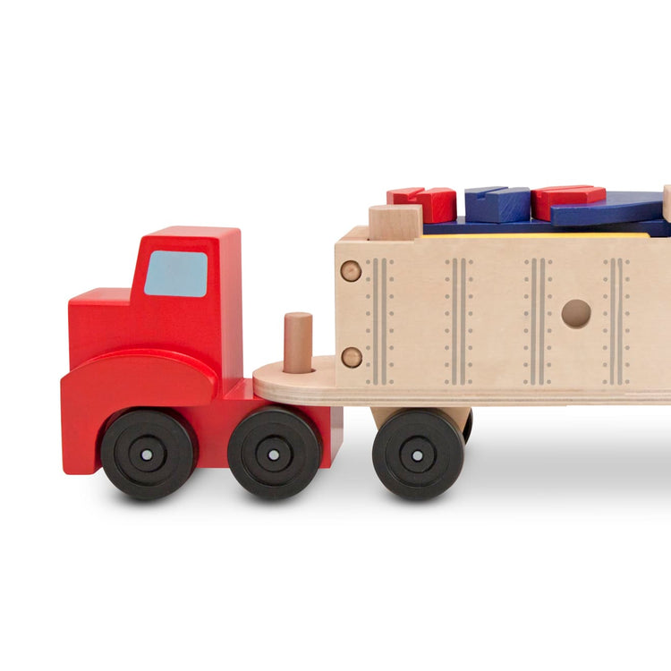 An assembled or decorated the Melissa & Doug Big Rig Truck Wooden Building Set (22 pcs)