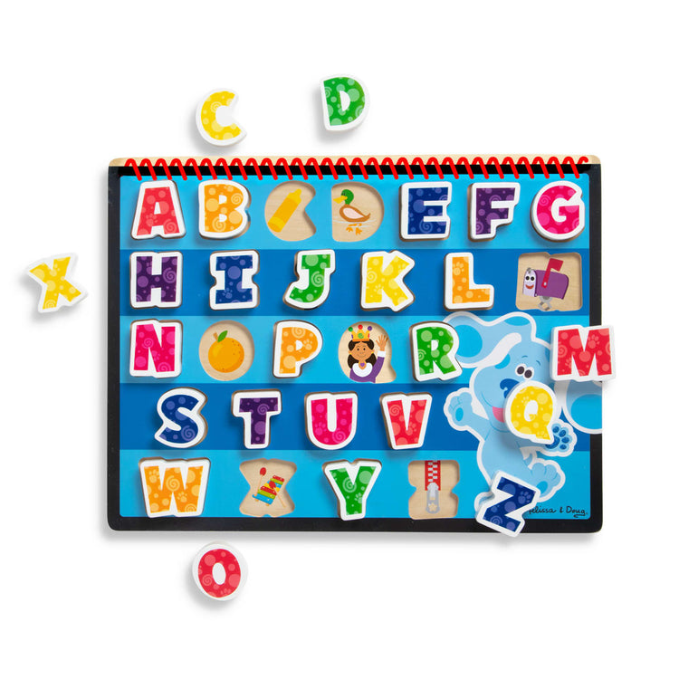 The loose pieces of the Melissa & Doug Blue's Clues & You! Wooden Chunky Puzzle - Alphabet (26 Pieces)