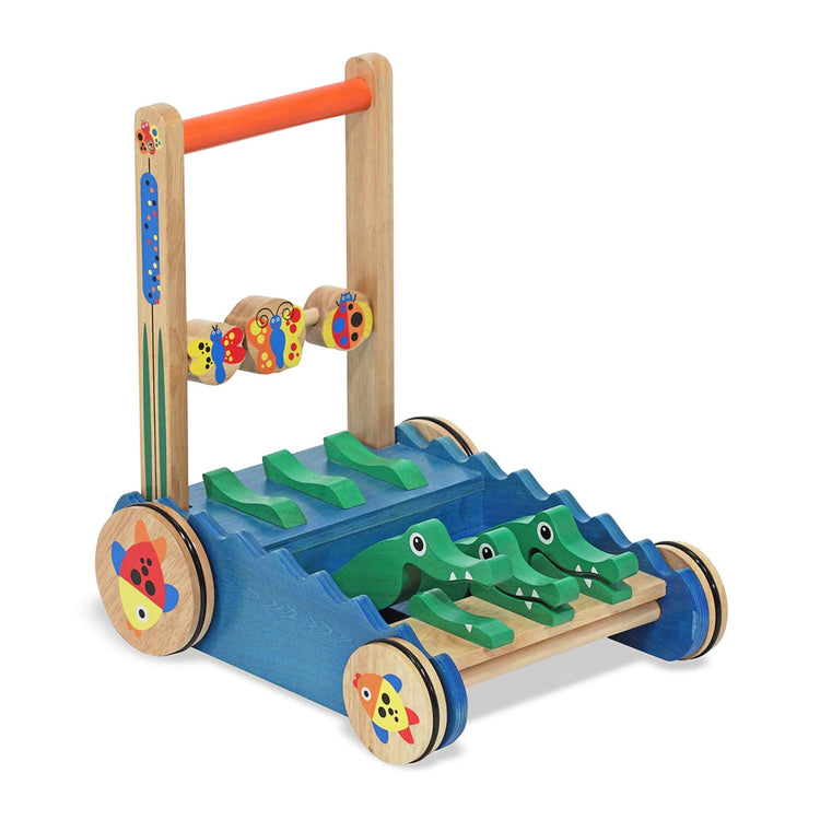 The loose pieces of the Melissa & Doug Deluxe Chomp and Clack Alligator Wooden Push Toy and Activity Walker