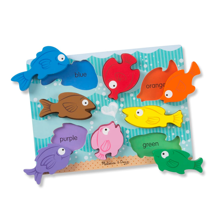 The loose pieces of the Melissa & Doug Colorful Fish Wooden Chunky Puzzle (8 pcs)