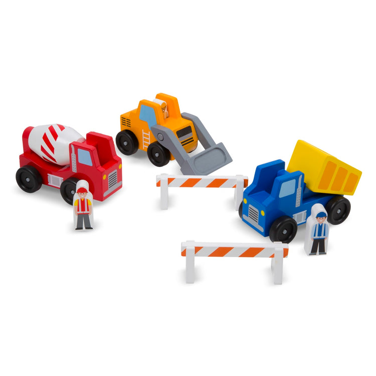 The loose pieces of the Melissa & Doug Construction Vehicle Wooden Play Set (8 pcs)