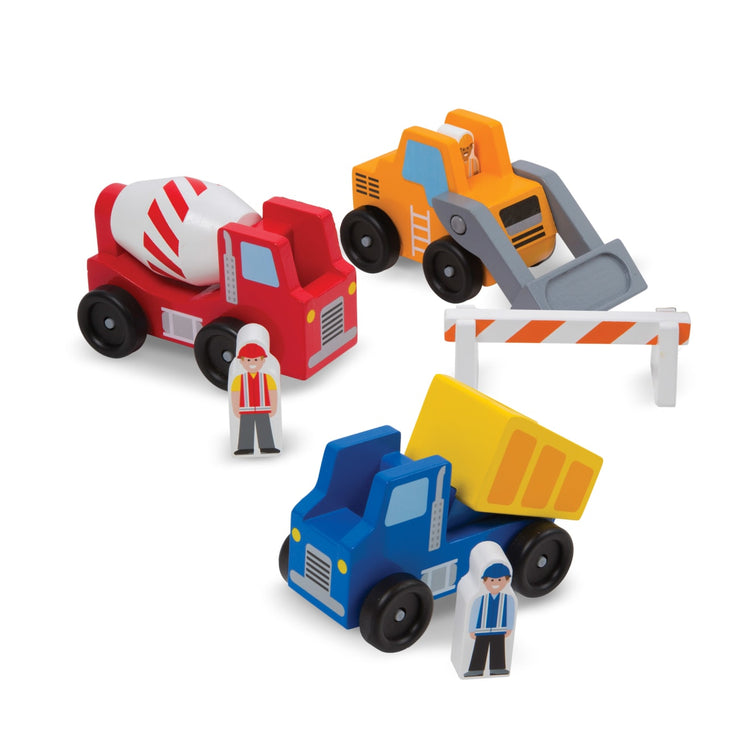 The loose pieces of the Melissa & Doug Construction Vehicle Wooden Play Set (8 pcs)