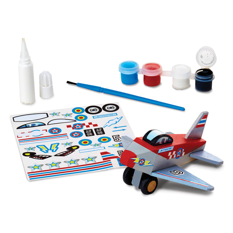 The loose pieces of the Melissa & Doug Decorate-Your-Own Wooden Plane Craft Kit