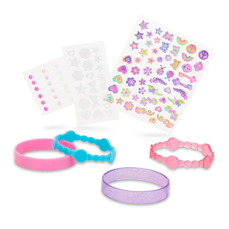 The loose pieces of the Melissa & Doug Design-Your-Own Bangles Bracelet-Making Set (Makes 4 Bangles)