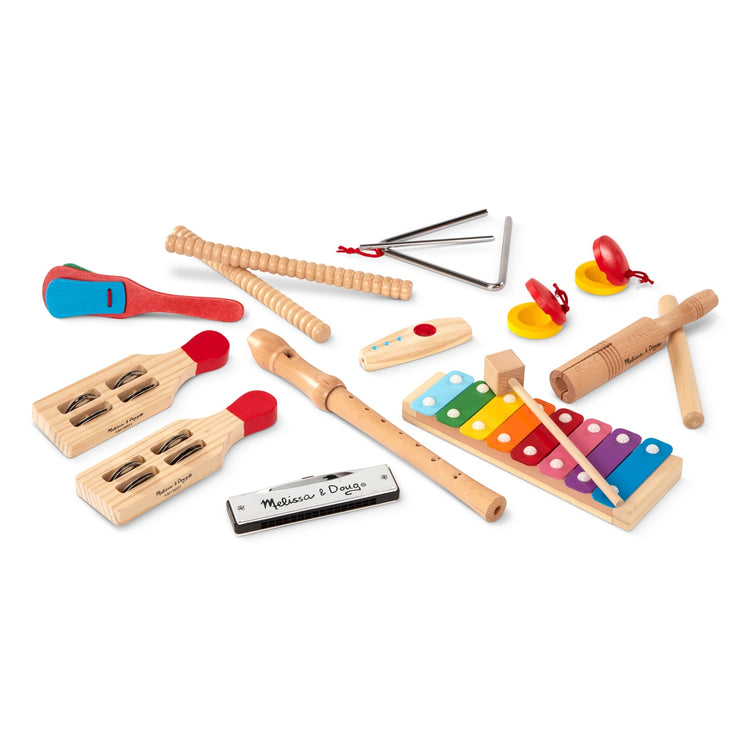 The loose pieces of the Melissa & Doug Deluxe Band Set With Wooden Musical Instruments and Storage Case