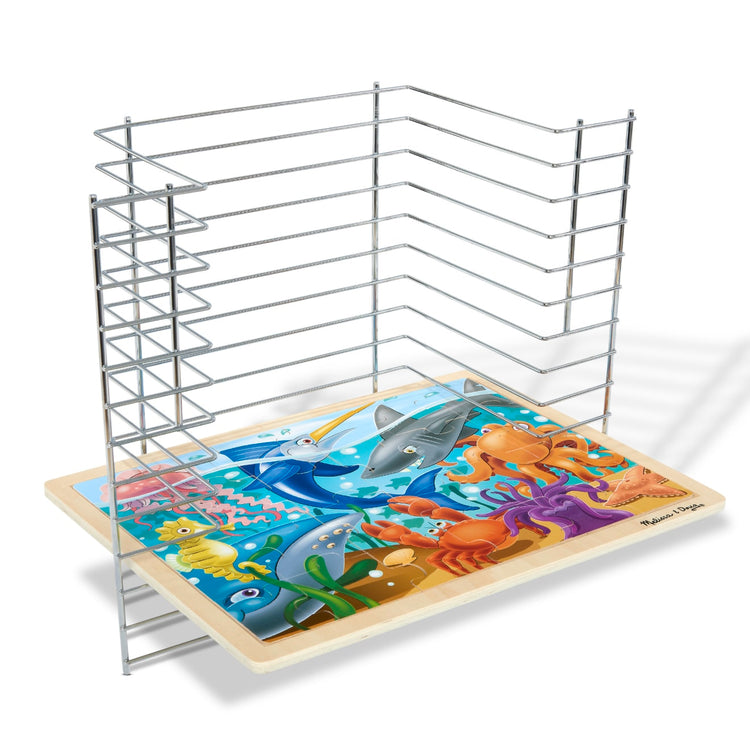 the Melissa & Doug Deluxe Metal Wire Puzzle Storage Rack for 12 Small and Large Puzzles
