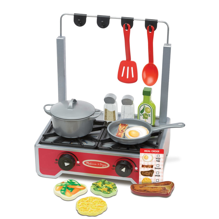 The loose pieces of the Melissa & Doug 19-Piece Deluxe Wooden Cooktop Set With Wooden Play Food, Durable Pot and Pan