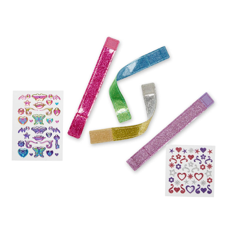The loose pieces of the Melissa & Doug Design-Your-Own Bracelets With 100+ Sparkle Gem and Glitter Stickers