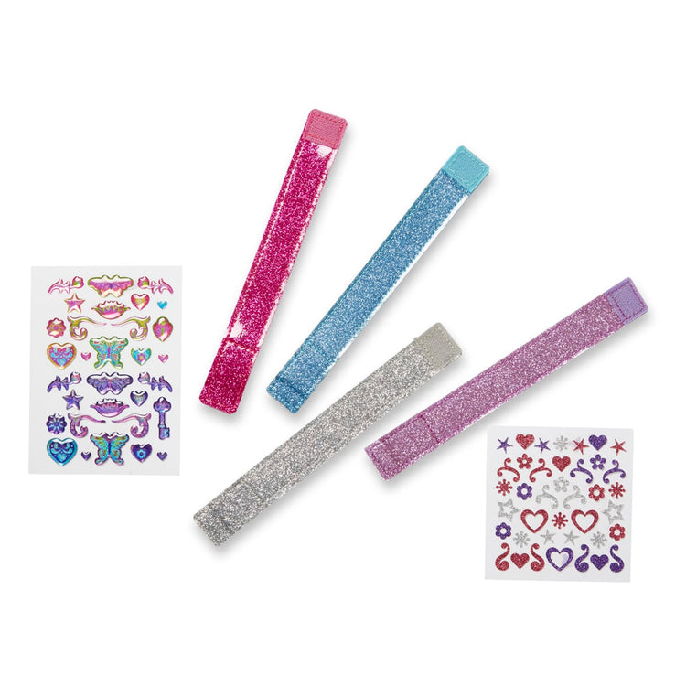 The loose pieces of the Melissa & Doug Design-Your-Own Bracelets With 100+ Sparkle Gem and Glitter Stickers