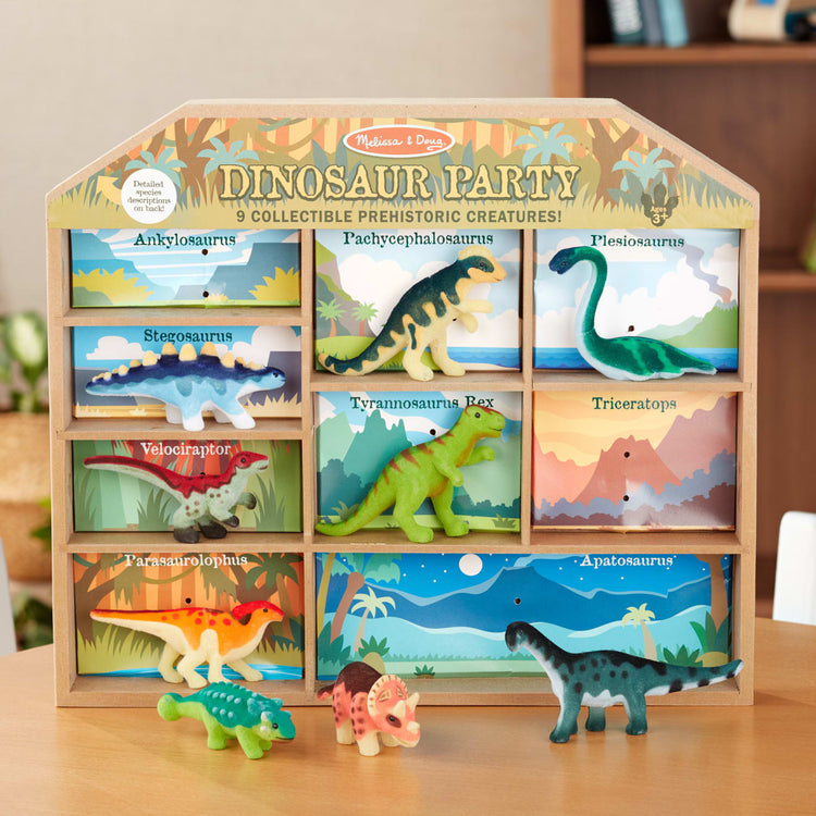 the Melissa & Doug Dinosaur Party Play Set - 9 Collectible Miniature Dinosaurs in a Case