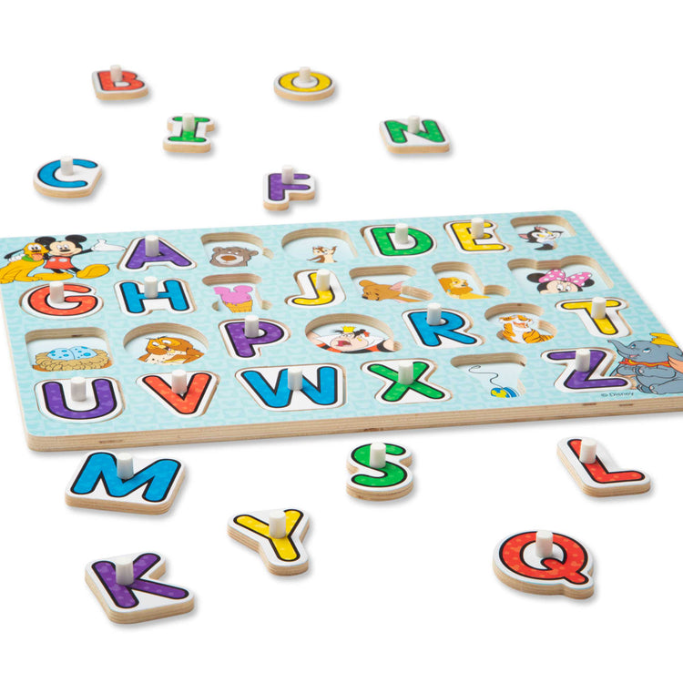 The loose pieces of the Melissa & Doug Disney Classics Alphabet Wooden Peg Puzzle (26 pcs)