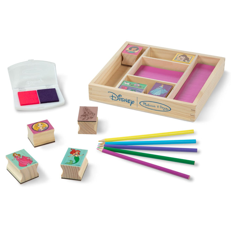 The loose pieces of the Melissa & Doug Disney Princess Wooden Stamp Set: 9 Stamps, 5 Colored Pencils, and 2-Color Stamp Pad