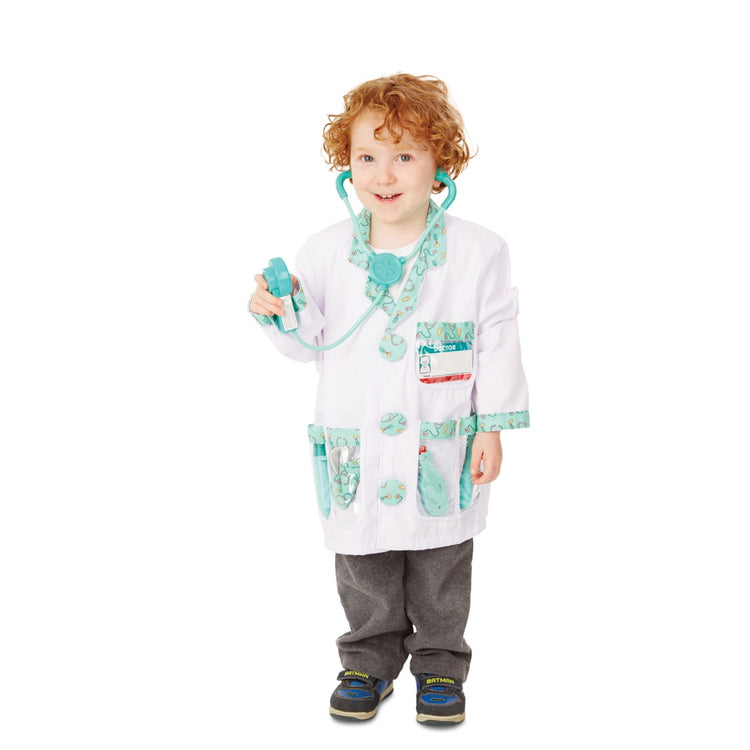 A child on white background with the Melissa & Doug Doctor Role Play Costume Dress-Up Set (8 pcs)