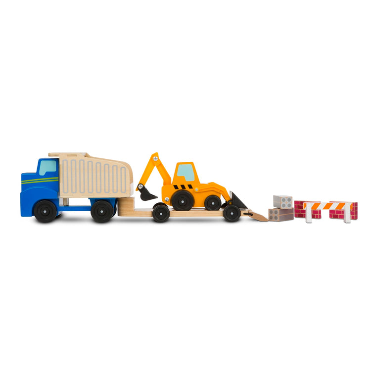 The loose pieces of the Melissa & Doug Classic Toy Wooden Dump Truck & Loader with Construction Pieces