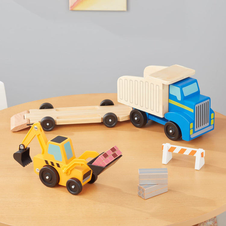the Melissa & Doug Classic Toy Wooden Dump Truck & Loader with Construction Pieces