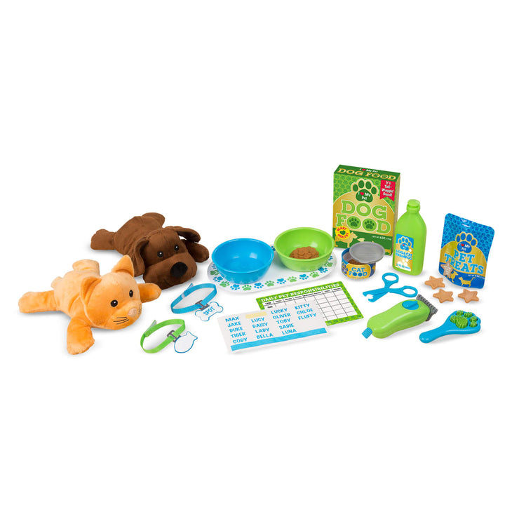 The loose pieces of the Melissa & Doug Feeding and Grooming Pet Care Play Set