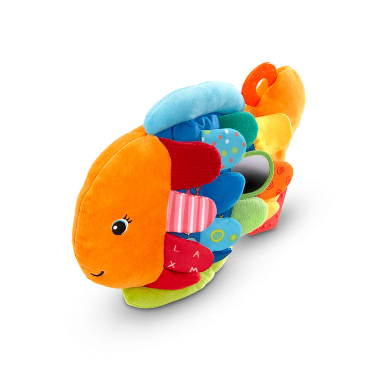 The loose pieces of the Melissa & Doug Flip Fish Soft Baby Toy