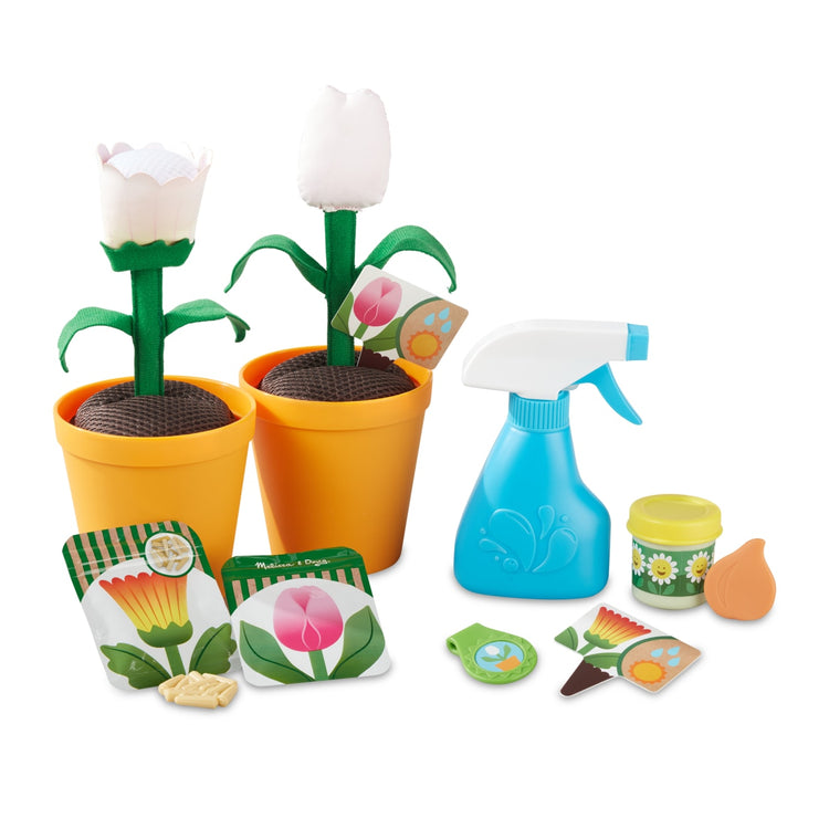 the Melissa & Doug Let’s Explore Flower Gardening Play Set with Color-Changing Flowers (16 Pieces)