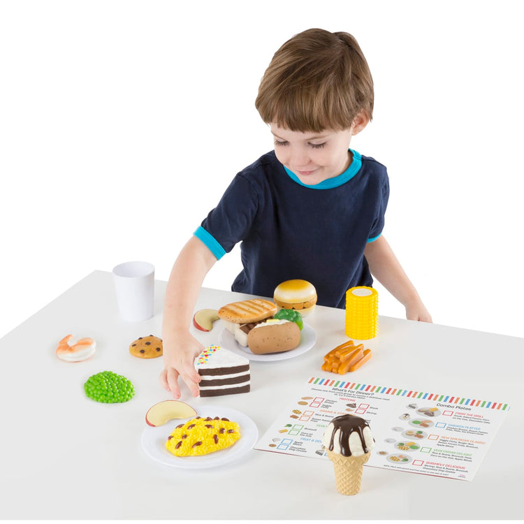 A child on white background with the Food Fun Combine & Dine Dinners - Blue