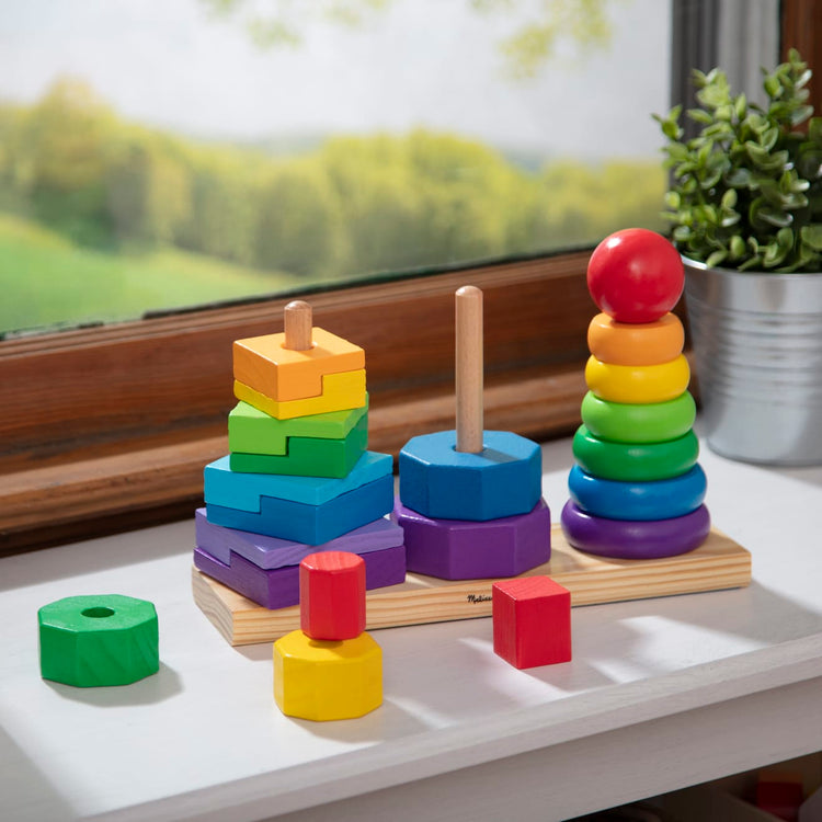 the Melissa & Doug Geometric Stacker - Wooden Educational Toy