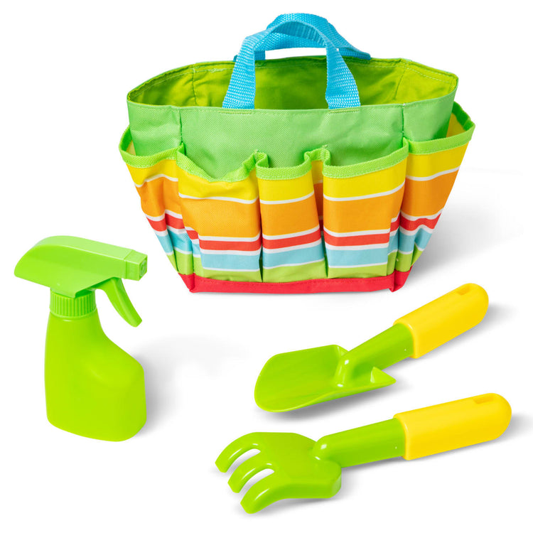 The loose pieces of the Melissa & Doug Sunny Patch Giddy Buggy Toy Gardening Tote Set With Tools