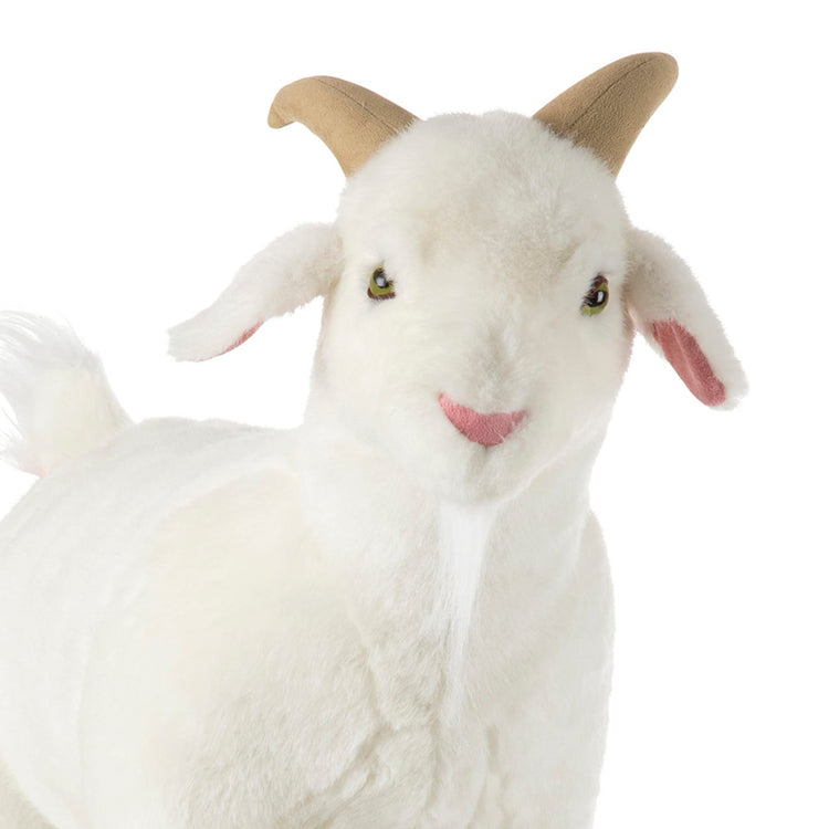 The loose pieces of the Melissa & Doug Giant Goat - Lifelike Stuffed Animal (22.5 inches tall)